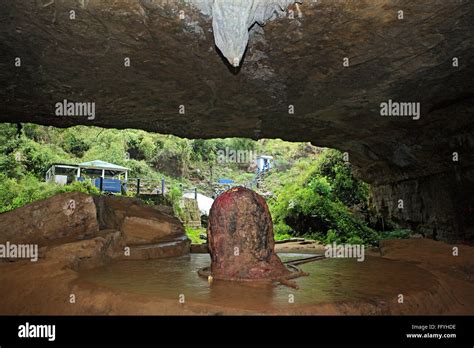 Mawsynram cave with shivaling stalagmite and stalactite ; Cherrapunji ...