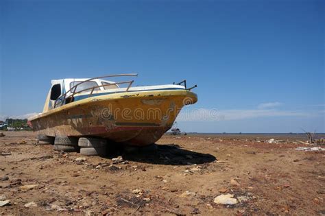 Old Abandoned Wrecked Speed Boat at Ship or Boat Graveyard Stock Photo ...