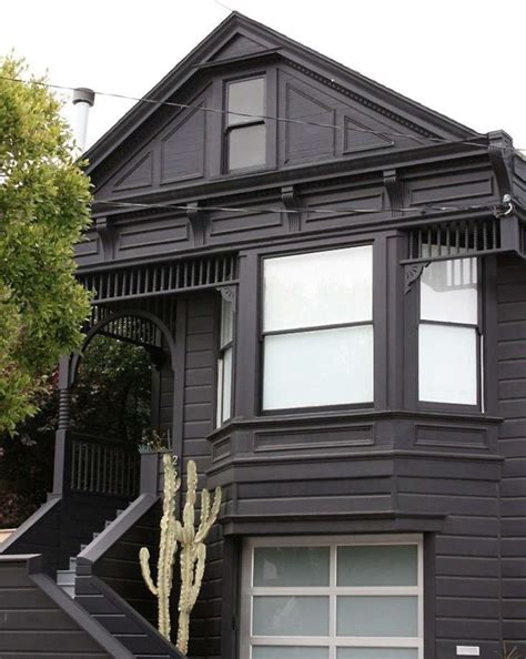 Black Houses: The Pros and Cons of a Dark Painted Facade - Gardenista