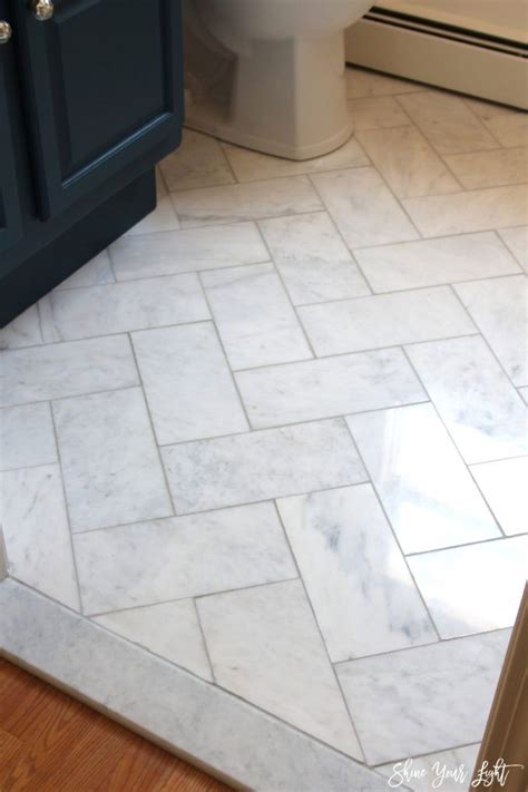 Herringbone Carrara Tile Bathroom Floor