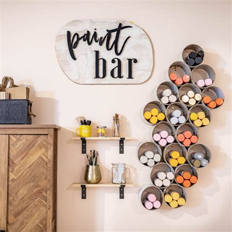 how to diy a chic spray paint storage wall | NEVER SKIP BRUNCH by Cara ...