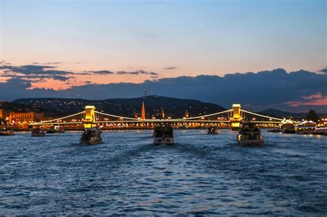 Premium Photo | Evening view of the Danube river, bridges, sights of ...