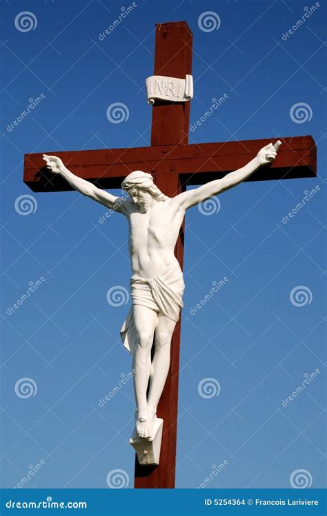 Statue Of Jesus Christ On Wood Cross Stock Images - Image: 5254364