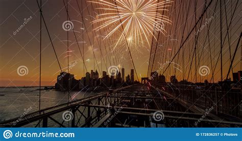 Festive Fireworks on a Brooklyn Bridge Sunset with Manhattan Skyline ...