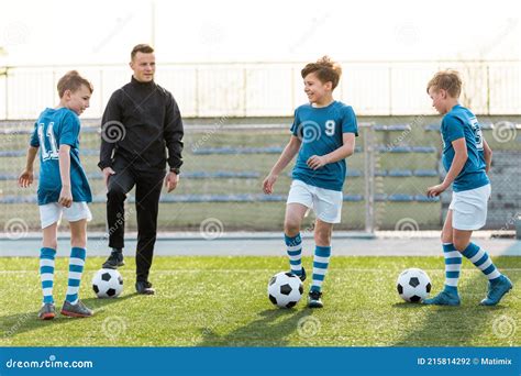 Happy Soccer Kids Smiling on Training. Group of School Boys Practicing ...