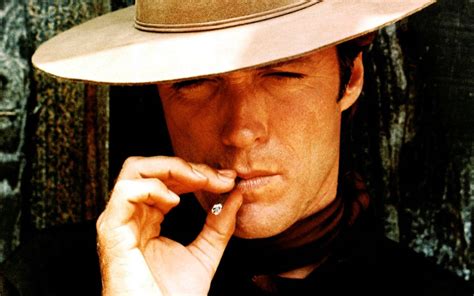 Download Clint Eastwood Cowboy Hat Smoking A Cigarette Wallpaper ...