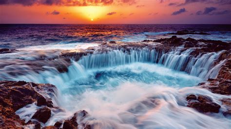 Beautiful Ocean Scenery View During Sunset Under Yellow Black Cloudy ...