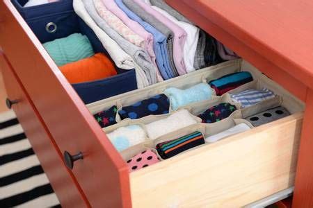 Folded clothes in chest of drawers closeup | Folding clothes, Drawers ...