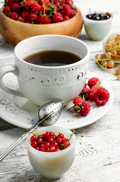 Premium Photo | Cup of berry tea