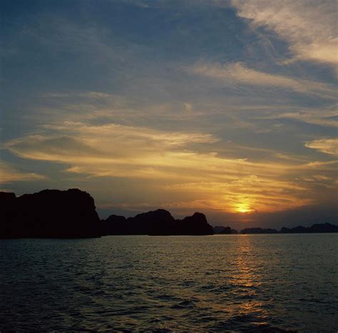 Halong Bay Sunset by Tbelarbi