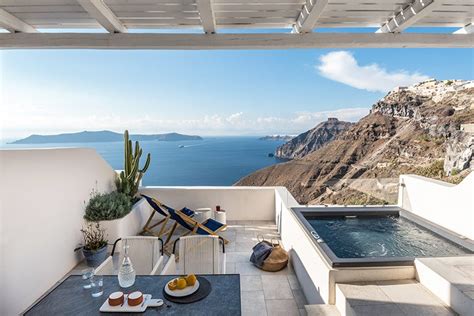 interior design laboratorium renovates scenic suites in santorini getaway