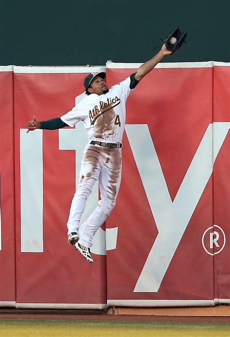 Getty Images - Got it! Coco Crisp of the Oakland Athletics...