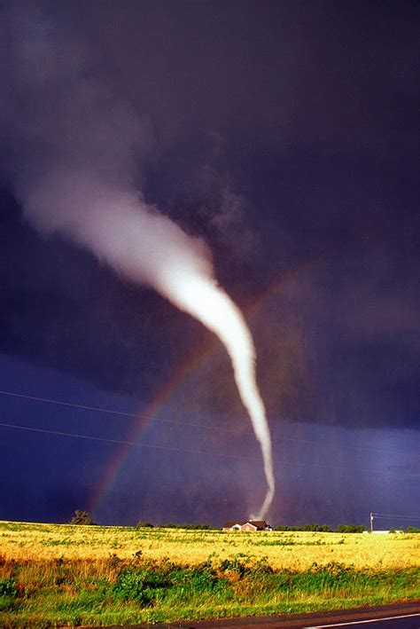 What happens when a tornado meets a rainbow : r/pics