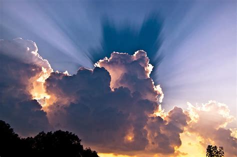 Sun Rays And Clouds Photograph by Amber Flowers