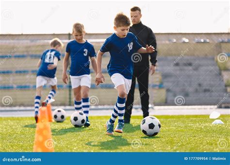 Young Boys in Sports Soccer Club on Training Unit. Kids Improve Soccer ...