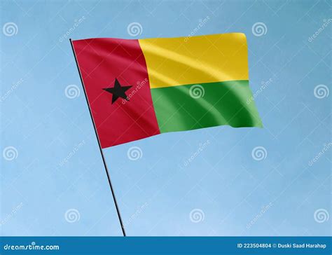 Guinea Bissau Flag Flying High in the Sky Guinea Bissau Independence ...