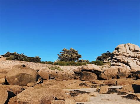 Premium Photo | Côte de granite rose in perfect sunset