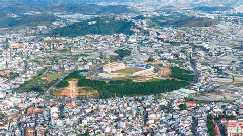 Aerial view of a Da Lat City with development buildings, transportation ...