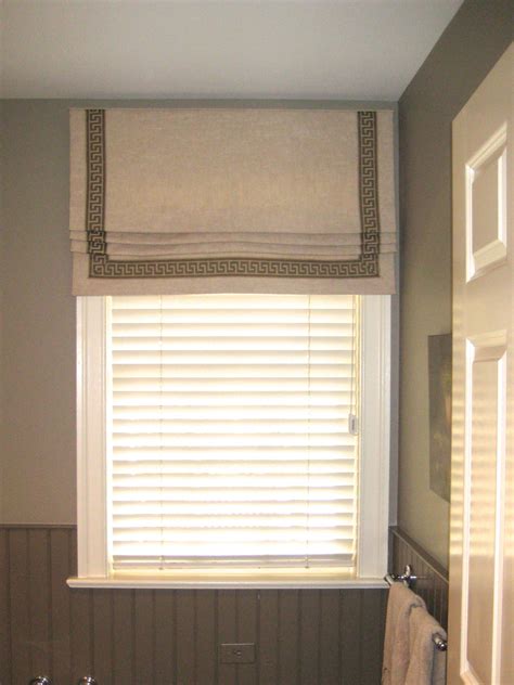 Tape trim adds an elegant border to this roman shade | Drapery designs ...