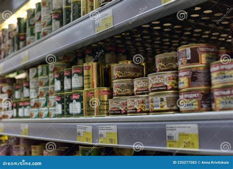 Canned Fish on a Shelf in a Supermarket Editorial Stock Photo - Image ...