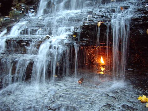 Eternal Flame Falls, New York. A flame fueled by natural gases burns ...