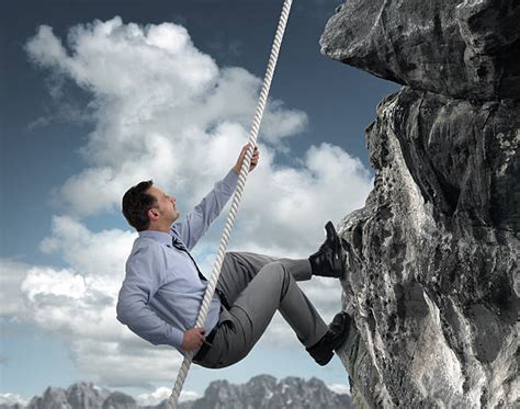 Business Man Climbing Mountain Stock Photos, Pictures & Royalty-Free ...