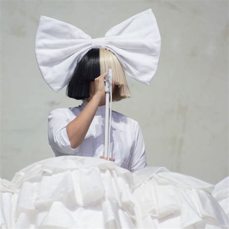 Sia designs limited capsule shoe collection to match her stage hair ...