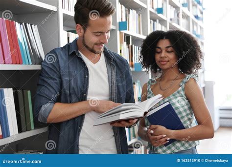 Happy Young People with Books Stock Photo - Image of african, female ...