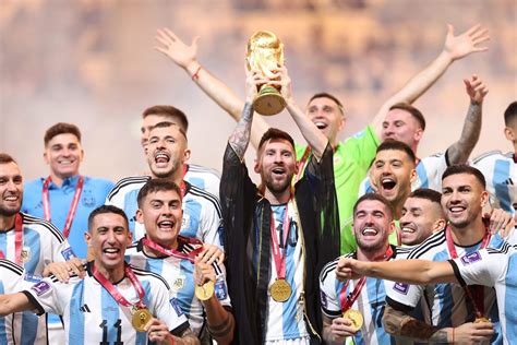 What was Lionel Messi wearing during World Cup trophy lift? - The Athletic