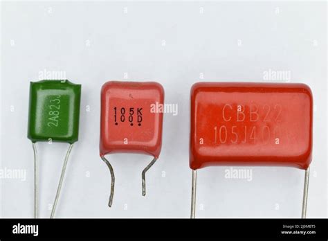 mylar capacitors on white background Stock Photo - Alamy