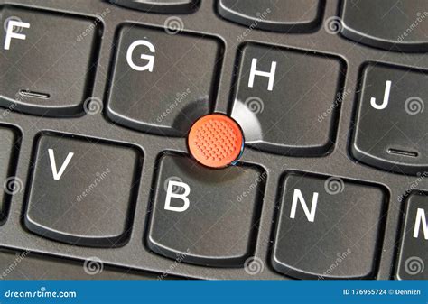 Red Trackpoint - Pointing Stick on a Laptop Keyboard Stock Photo ...