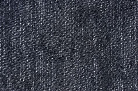 Straight and simple, a black denim background, cloth jeans fabric ...