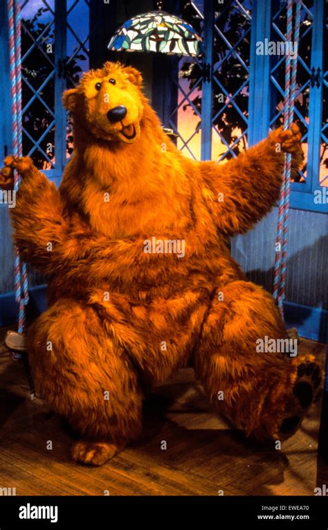 Bear in the big blue house Stock Photo - Alamy