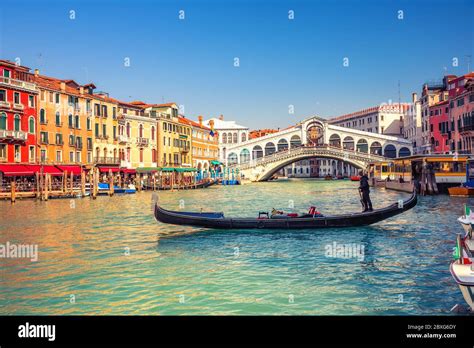 Gondola on Grand canal near Rialto bridge in Venice Stock Photo - Alamy