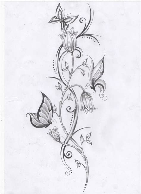 a tattoo design with flowers and butterflies on it