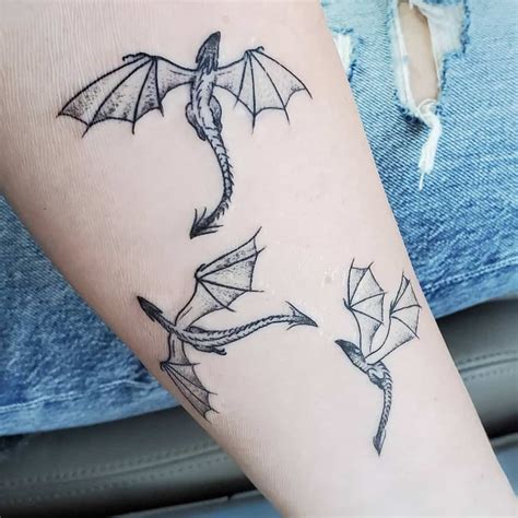 Flying Dragon Silhouette Tattoo