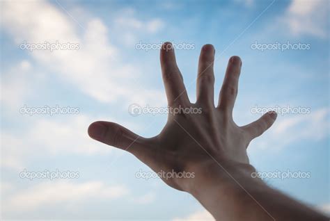 Hand reaching to sky. — Stock Photo © eevl #30140255