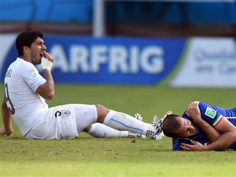 Luis Suarez bite: Fifa charges Uruguay striker with biting Giorgio ...