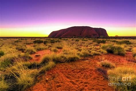 Uluru at sunrise Photograph by Benny Marty