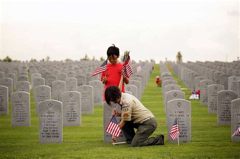 Flags placed at veterans cemetery 'because someone fought for us'