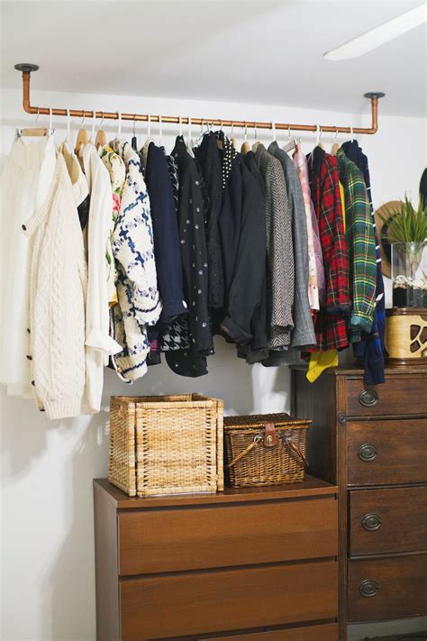 Hanging Copper Pipe Clothing Rack DIY - A Beautiful Mess