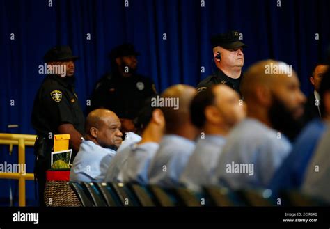 Prisoners and correctional officers listen as Pope Francis meets with ...