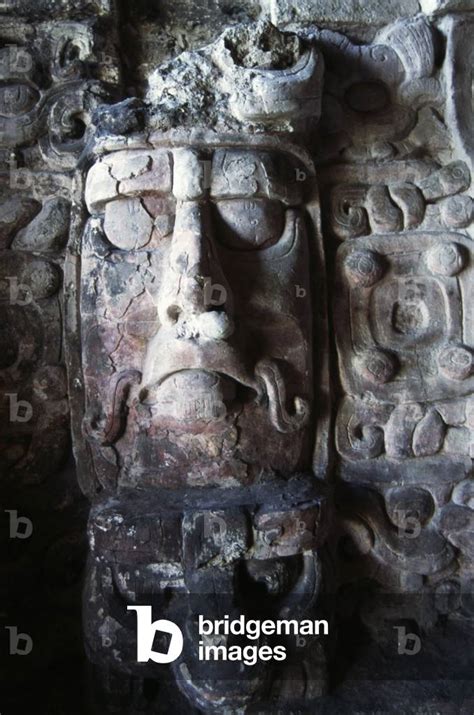 Giant stucco mask depicting Sun God Kinich Ahau, detail of one of ...