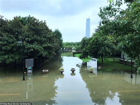 Wuhan issues flooding red alert as river surges after heavy rain ...