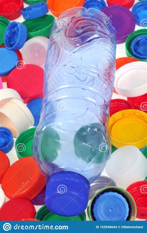 Bottle and Plastic Caps of Different Colors Stock Photo - Image of ...