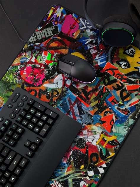 a computer keyboard and mouse on a colorful surface