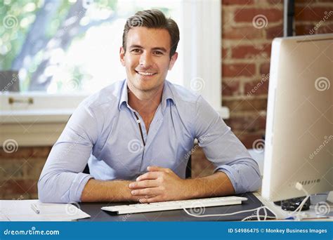 Man Working at Computer in Contemporary Office Stock Image - Image of ...