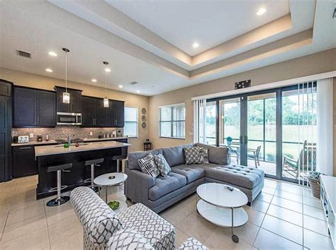 Living room with two tiered tray ceiling and tile flooring Tray Ceiling ...