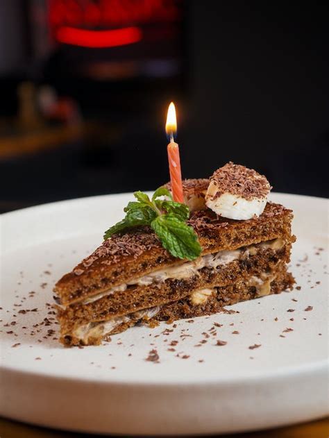 A Slice of Cake with a Birthday Candle · Free Stock Photo