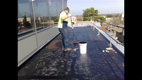 Waterproofing Flat Concrete Roof using Liquid Rubber - YouTube